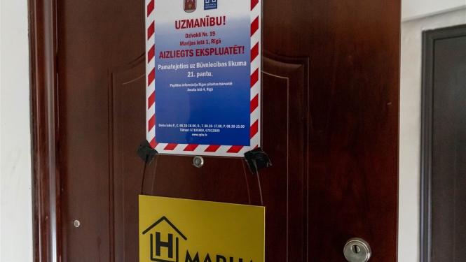 Uzraksts, kas aizliedz ekspluatēt telpas