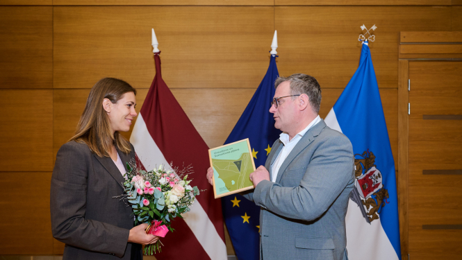 Pludmales volejboliste Tīna Graudiņa un Rīgas domes priekšsēdētājs Viesturs Kleinbergs