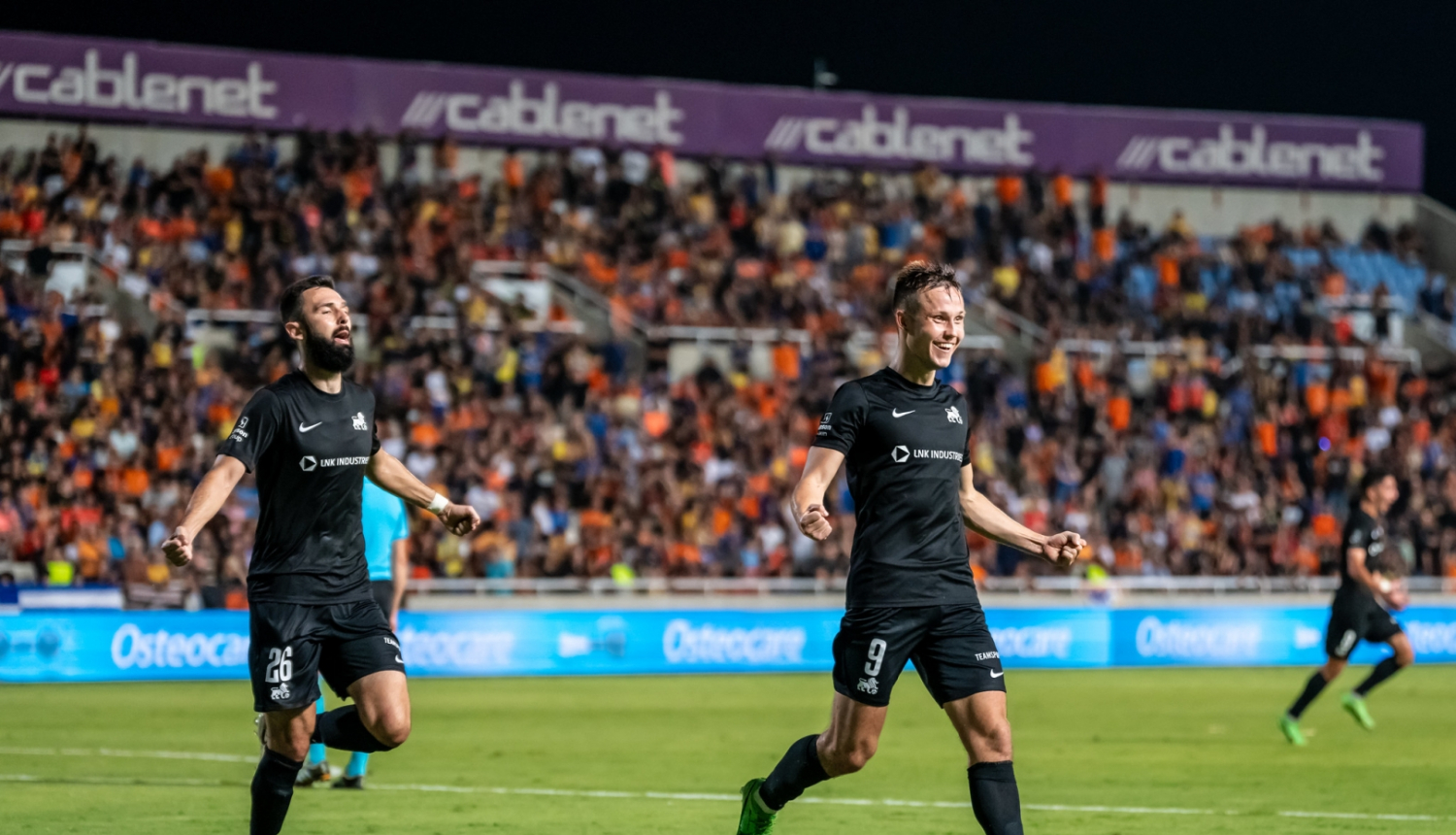 Futbolisti futbola laukumā